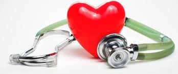 Red heart with green stethoscope symbolizing heart health care.